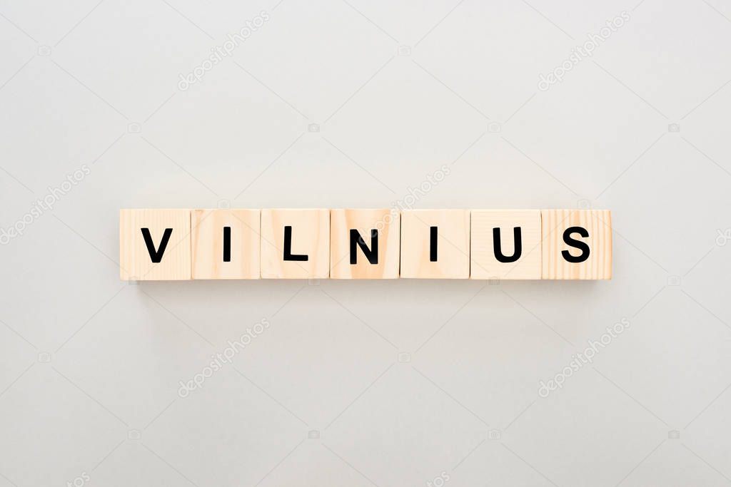 top view of wooden blocks with Vilnius lettering on white background