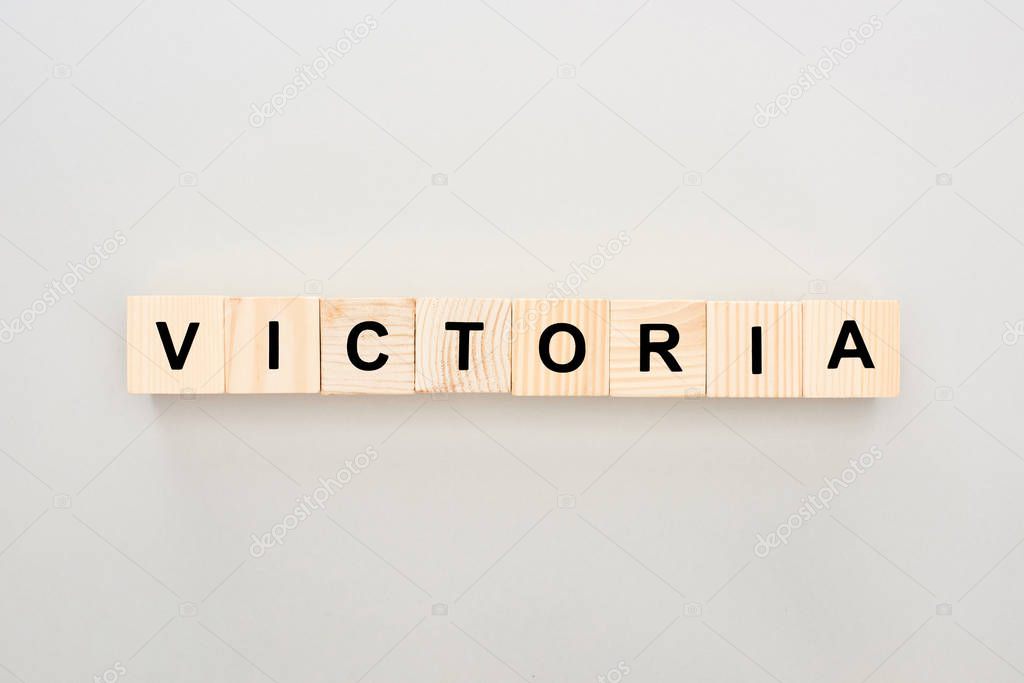 top view of wooden blocks with Victoria lettering on white background