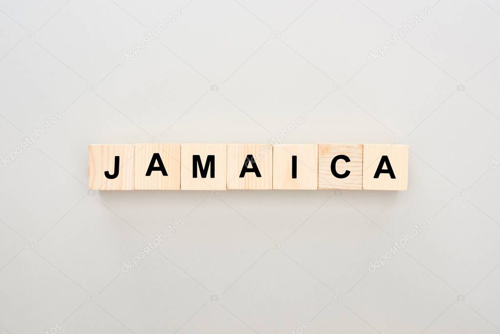 top view of wooden blocks with Jamaica lettering on white background