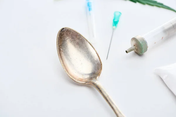 Close View Silver Spoon Syringe Needles White Background — Stock Photo, Image