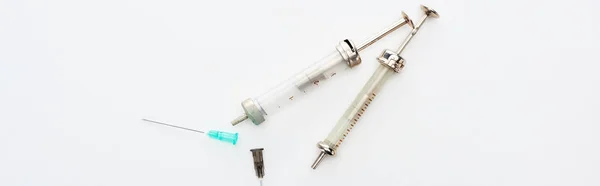 Top View Aged Syringes Needles White Background Copy Space Panoramic — Stock Photo, Image