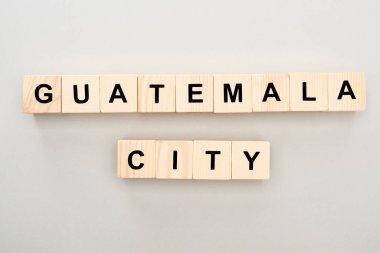 gri arka plan üzerinde Guatemala şehir yazı ile ahşap blokların üst görünümü