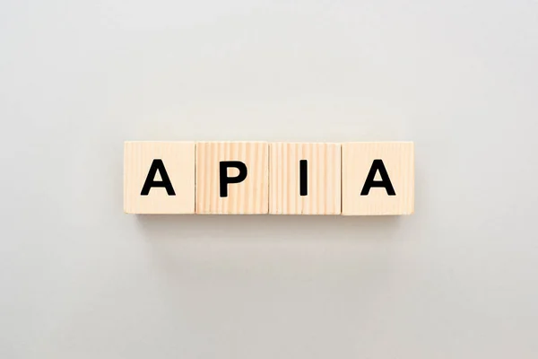 Top View Wooden Blocks Apia Lettering Grey Background — Stock Photo, Image