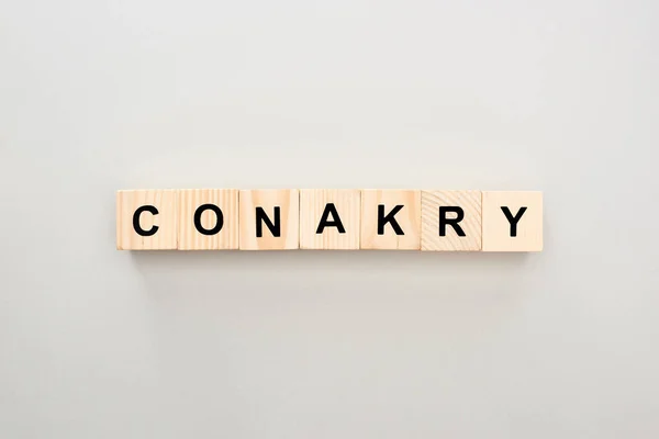 Top View Wooden Blocks Conakry Lettering Grey Background — Stock Photo, Image