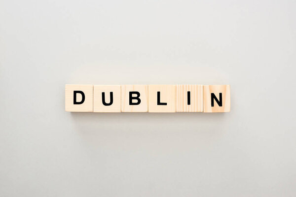 top view of wooden blocks with Dublin lettering on grey background