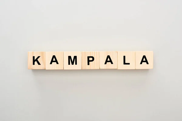 Ansicht Von Holzblöcken Mit Kampala Schriftzug Auf Grauem Hintergrund — Stockfoto