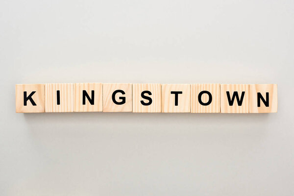 top view of wooden blocks with Kingstown lettering on grey background