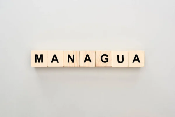 Top View Wooden Blocks Managua Lettering Grey Background — Stock Photo, Image