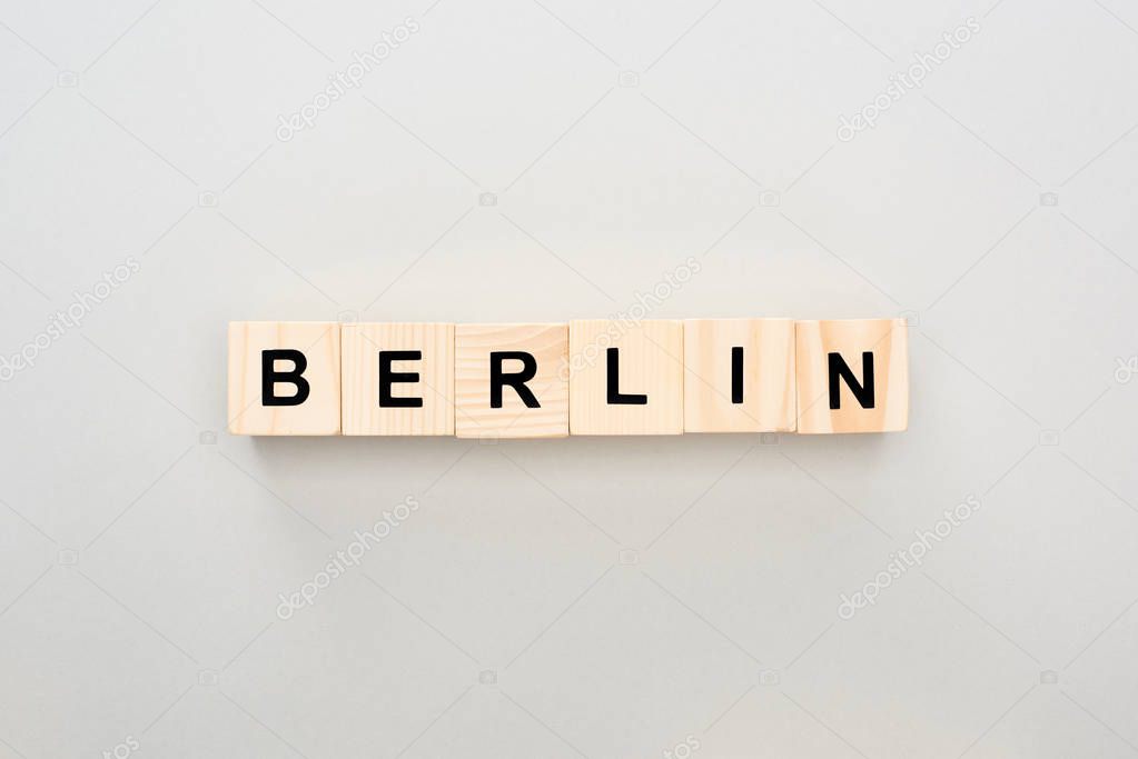 top view of wooden blocks with Berlin lettering on grey background