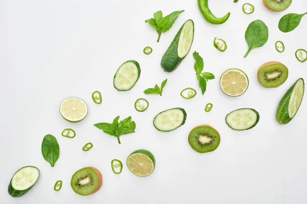Top View Fresh Cucumbers Kiwi Limes Peppers Greenery — Stock Photo, Image