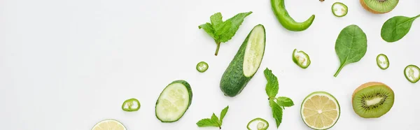 Panoramic Shot Fresh Cucumbers Kiwi Limes Peppers Greenery — Stock Photo, Image