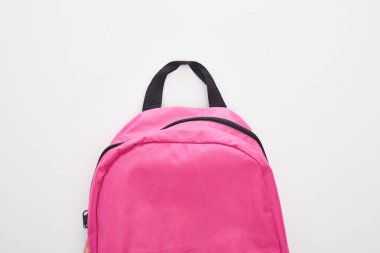 Closed bright pink school bag isolated on white clipart