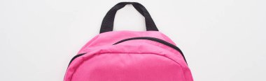 Panoramic shot of closed bright pink school bag isolated on white clipart