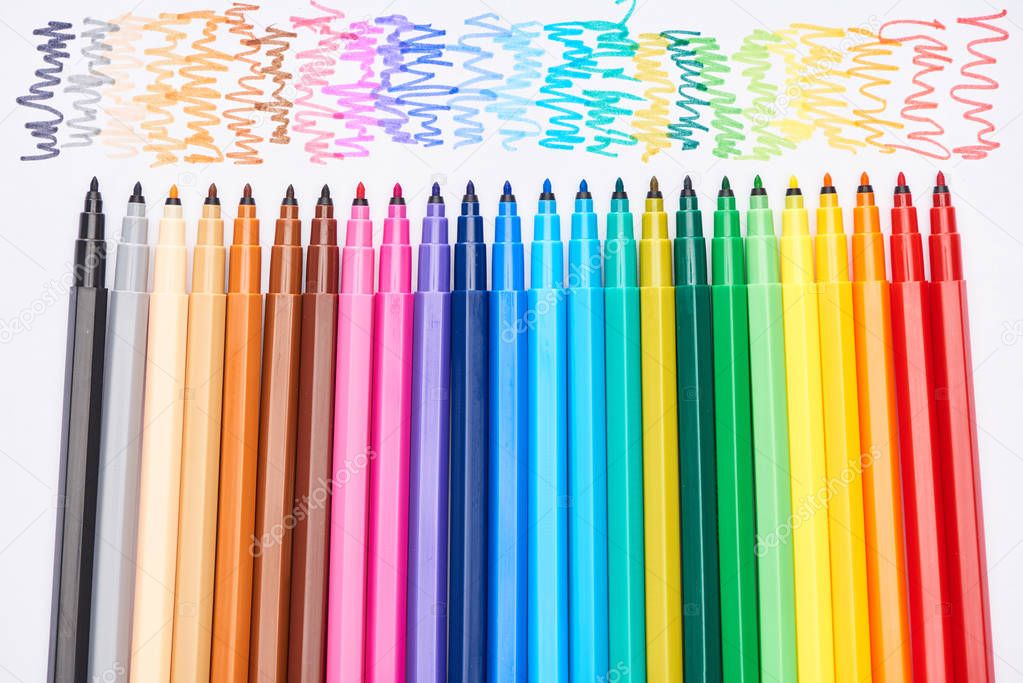 Set of bright colored felt-tip pens without cups isolated on white