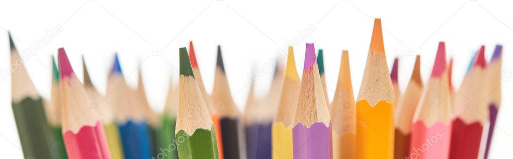 Panoramic shot of sharpened end bright color pencils isolated on white