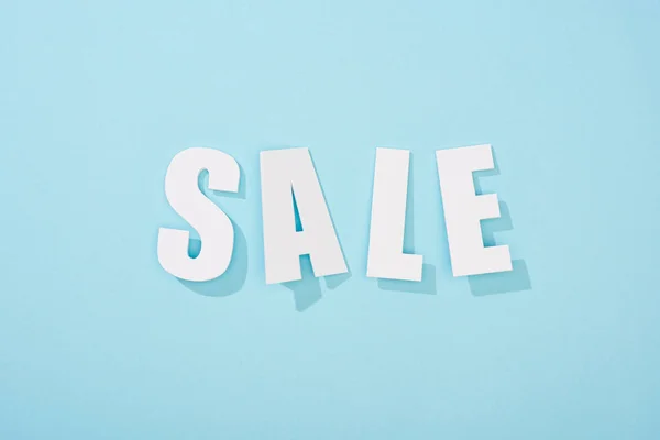 Top View White Sale Lettering Light Blue Background — Stock Photo, Image