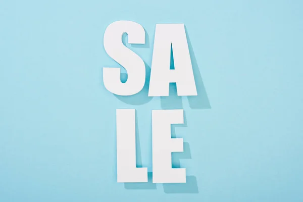 Top View White Sale Lettering Blue Background Copy Space — Stock Photo, Image