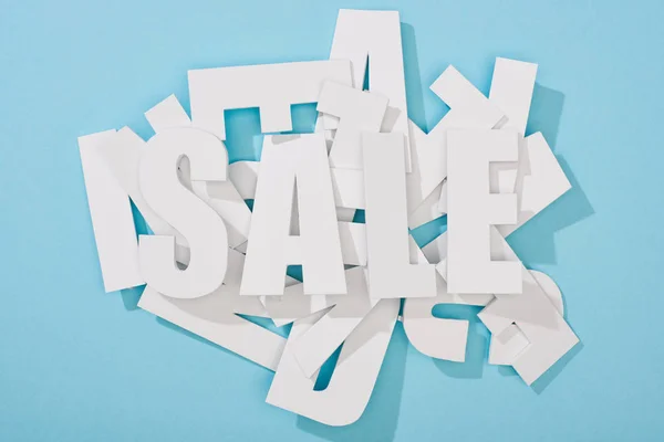 Top View White Sale Word Pile Letters Blue Background — Stock Photo, Image