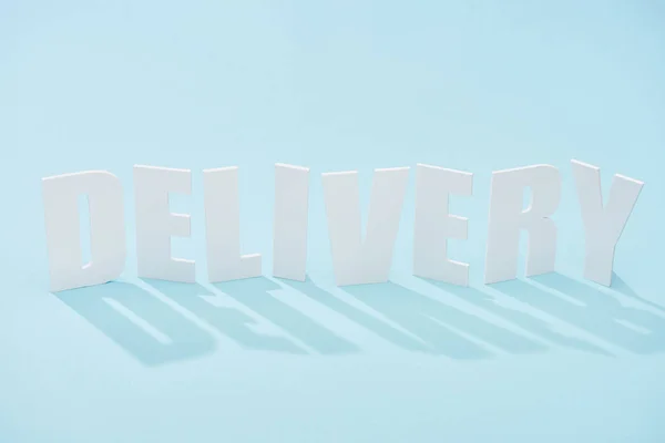 Delivery Lettering Shadow Blue Background Copy Space — Stock Photo, Image