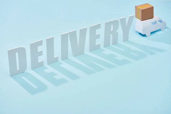 Delivery Inscription White Mini Truck Cardboard Box Blue Background — Stock Photo, Image