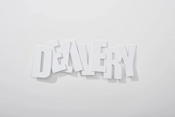 Crooked Delivery Inscription Shadow White Background — Stock Photo, Image