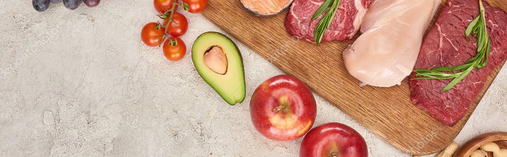 Panoramic Shot Raw Meat Poultry Rosemary Twigs Wooden Cutting Board Royalty Free Stock Photos