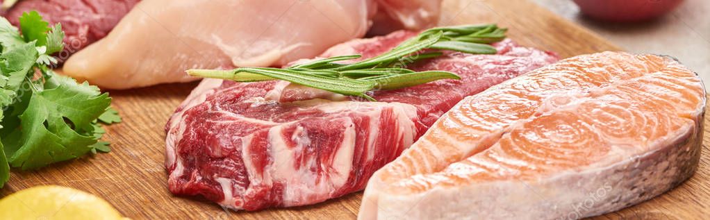 Panoramic Shot Raw Meat Rosemary Twig Salmon Chicken Greenery Wooden Stock Image