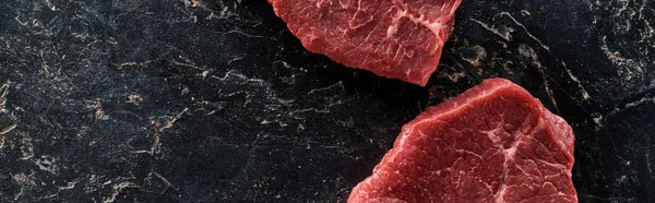 Panoramic Shot Unprocessed Beef Steaks Black Marble Surface — Stock Photo, Image