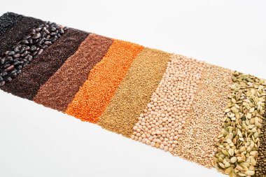 assorted black beans, rice, quinoa, buckwheat, chickpea, pumpkin seeds and red lentil isolated on white clipart