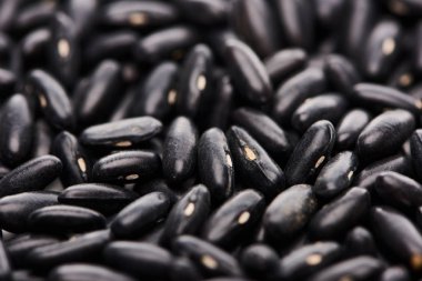 close up view of raw organic black beans  clipart