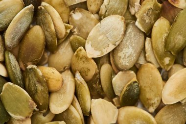 close up view of aromatic roasted pumpkin seeds clipart