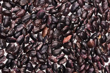 top view of uncooked organic big black beans clipart
