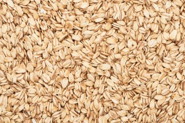 top view of raw pressed organic oats clipart