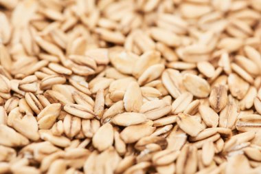 close up view of unprocessed pressed organic oats clipart