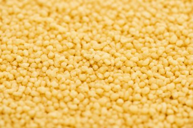 close up view of uncooked organic couscous clipart