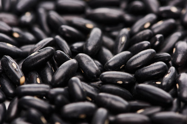 close up view of unprocessed small black beans 