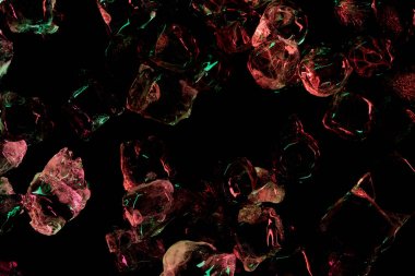 top view of ice cubes with red and green illumination isolated on black clipart