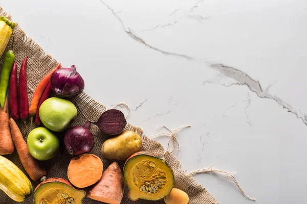 Top View Hessian Autumn Vegetables Marble Surface — Stock Photo, Image