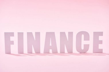 pembe arka plan üzerinde gölge ile finans yazıt