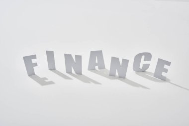 beyaz arka plan üzerinde gölgeler ile finans harfleri
