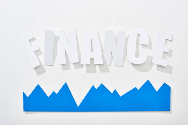 top view of finance inscription with blue statistic graph on white background