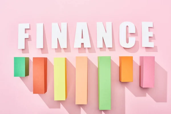 Top View Finance Inscription Color Block Graph Pink Background — Stock Photo, Image