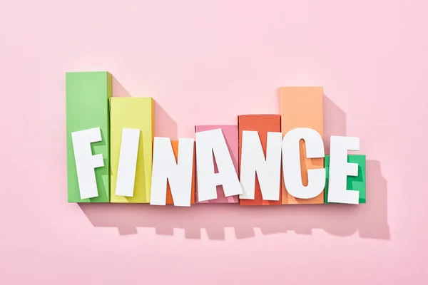 Top View Finance Inscription Pink Background Color Block Graph — Stock Photo, Image