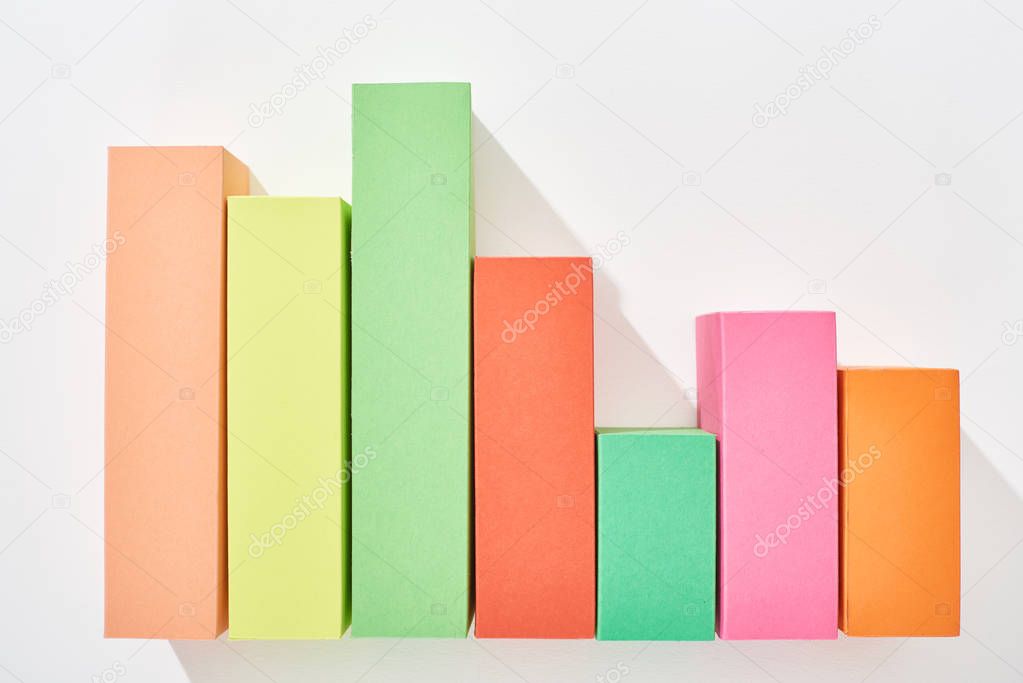 top view of multicolor analytical graph on white background