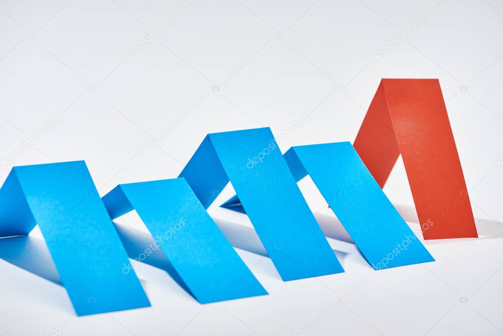 chart from blue and red paper sheets on white background