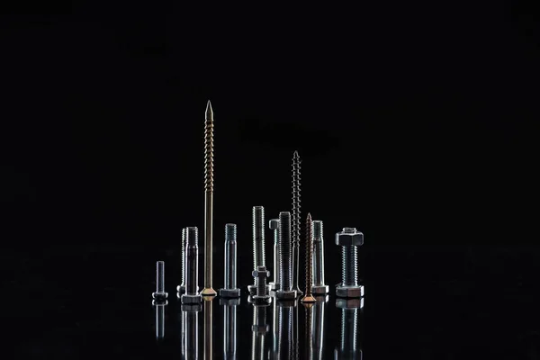 Various Metallic Screws Isolated Black Copy Space — Stock Photo, Image