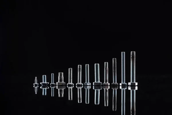 New Shiny Metallic Bolts Isolated Black — Stock Photo, Image