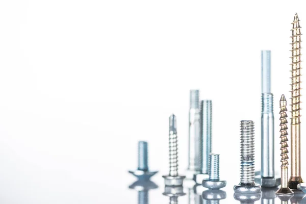 Diverse Shiny Steel Bolts Studs Isolated White — Stock Photo, Image