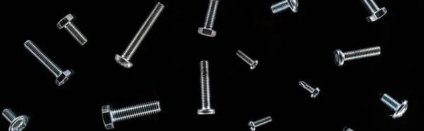 Panoramic Shot Scattered Metal Bolts Pattern Isolated Black — Stock Photo, Image