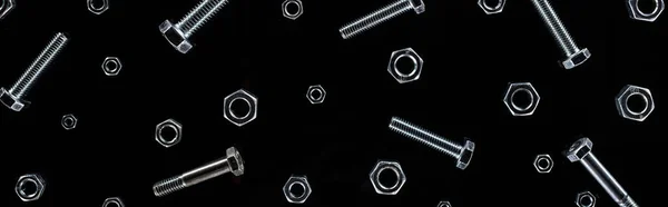 Panoramic Shot Scattered Metal Bolts Nuts Pattern Isolated Black — Stock Photo, Image